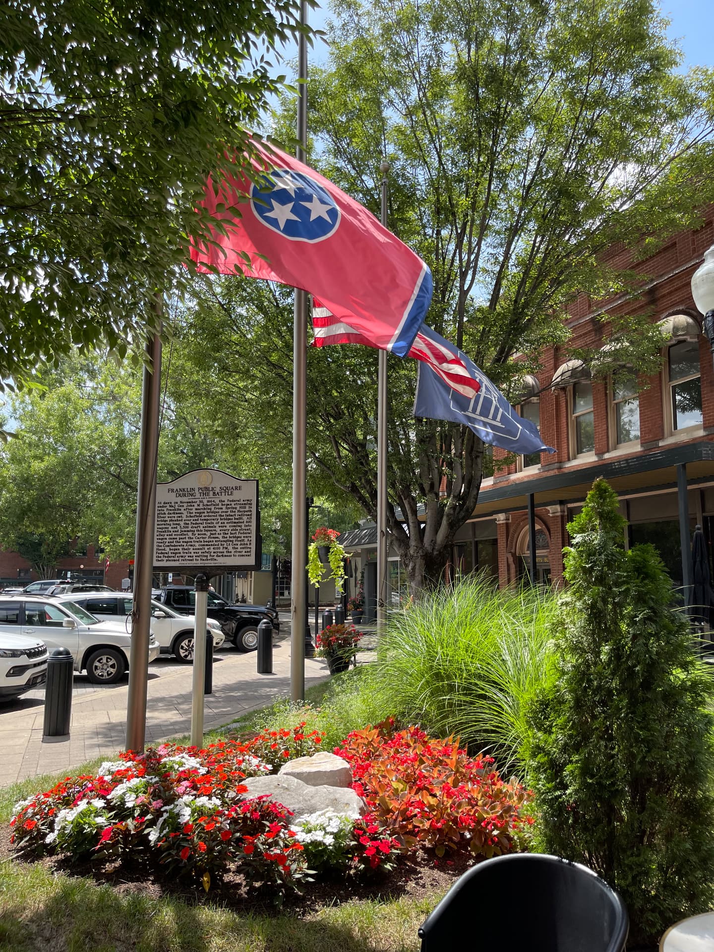 The American flag flying above the public square in historic downtown Franklin, Tennessee