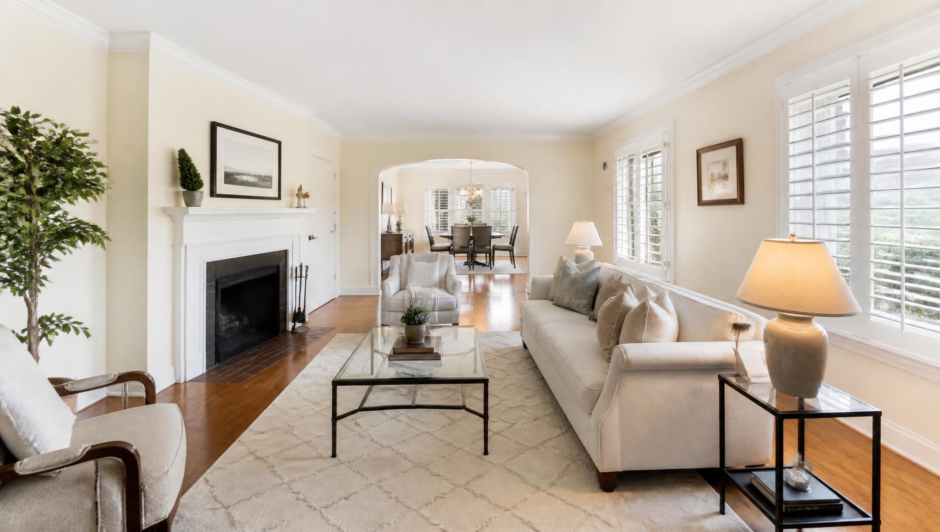 Sunlit, tidy living room prepared for a home sale